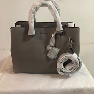 Michael Kors Handbag; Brand new, Never been used; Smooth gray; $350; Kendall